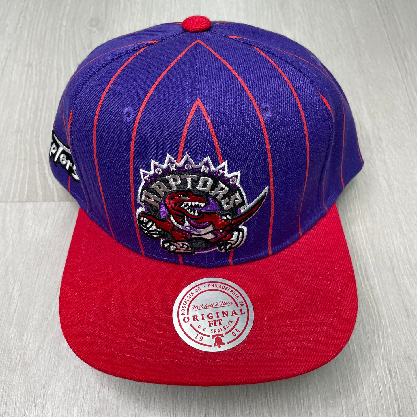 GORRA M&N RAPTORS