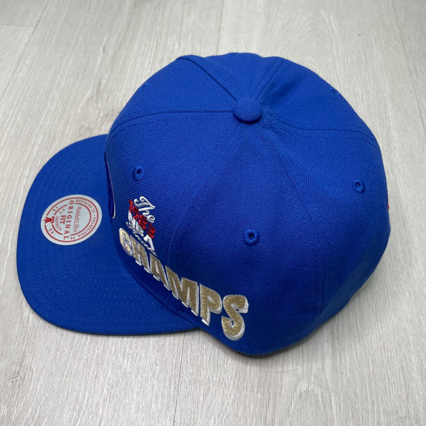 GORRA M&N 76ERS